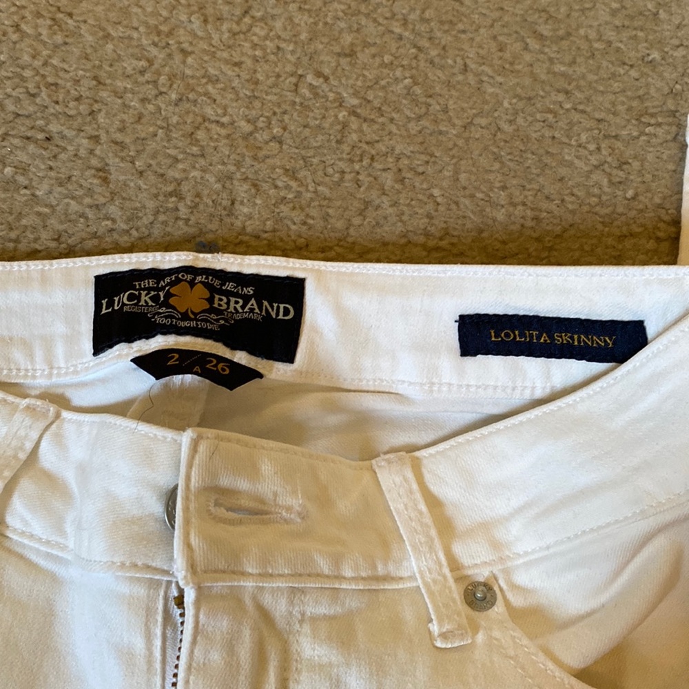 Lightly Worn white lucky jeans